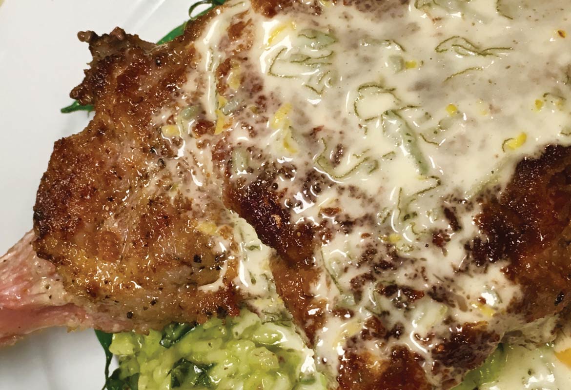 Veal Chop Saltimbocca with Roasted Garlic-Spinach Risotto and Lemon-Sage Butter