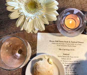 Boone Hall Farms: Flowers and candlelight dot the tables, and soft live music fills the background while diners pore over the drink and dinner options.