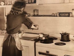 Grandmama cooks in her kitchen on Hasell Street in Charleston in 1946. She still has that cast iron skillet.