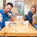 he Bulsiewicz family enjoys time together at Tropical Smoothie Cafe in The Market at Oakland.